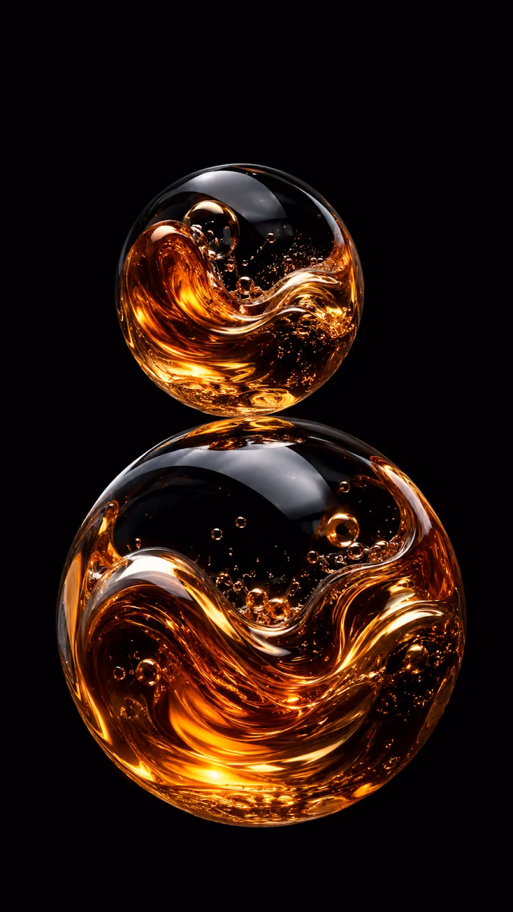 Abstract Liquid Amber and Glass Spheres on Black Background - Free 4K Desktop Wallpaper Background