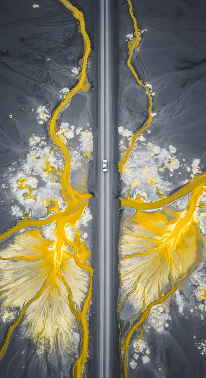 Download Aerial View of Car on Road Amidst Yellow Sulfur Streams Wallpaper in Mobile HD Aerial View of Car on Road Amidst Yellow Sulfur Streams - Free Mobile AMOLED Wallpaper Background