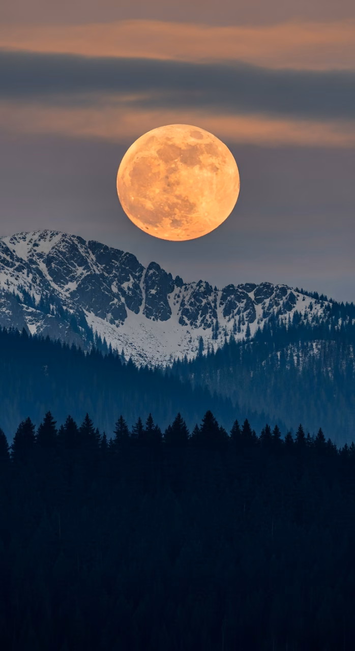 Download Atmospheric Dusk View of Snowy Mountain Peaks with Giant Orange Moon Wallpaper in Mobile HD Atmospheric Dusk View of Snowy Mountain Peaks with Giant Orange Moon - Free Mobile AMOLED Wallpaper Background