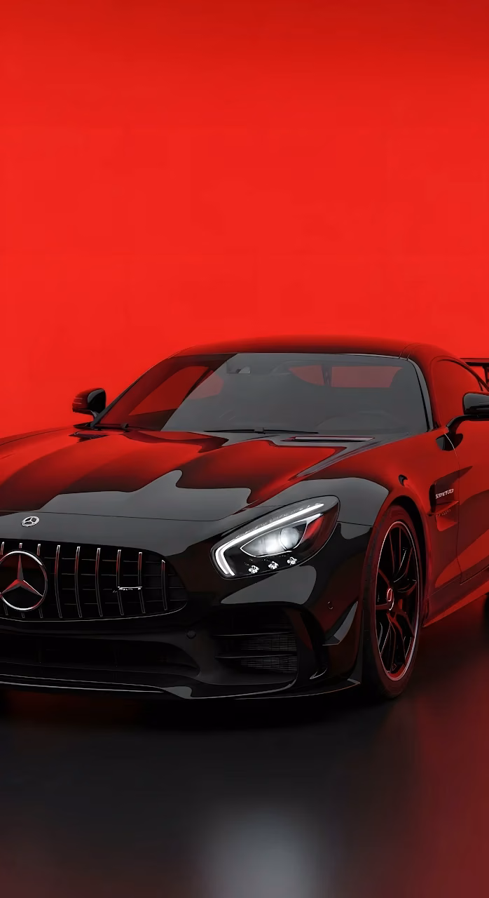 Download Black Mercedes AMG GT Sports Car Against Vibrant Red Background Wallpaper in Mobile HD Black Mercedes AMG GT Sports Car Against Vibrant Red Background - Free Mobile AMOLED Wallpaper Background