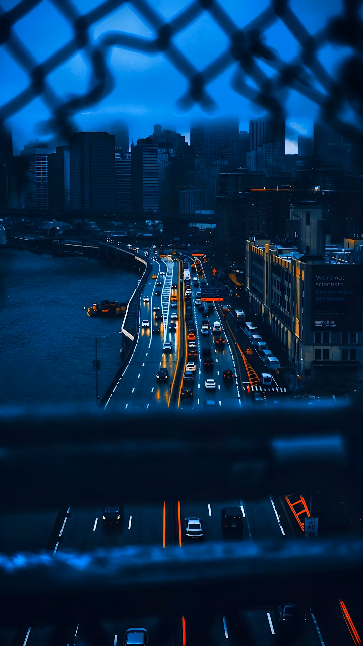 Download City Highway at Night Viewed Through Chain Link Fence Wallpaper in Mobile HD City Highway at Night Viewed Through Chain Link Fence - Free Mobile AMOLED Wallpaper Background