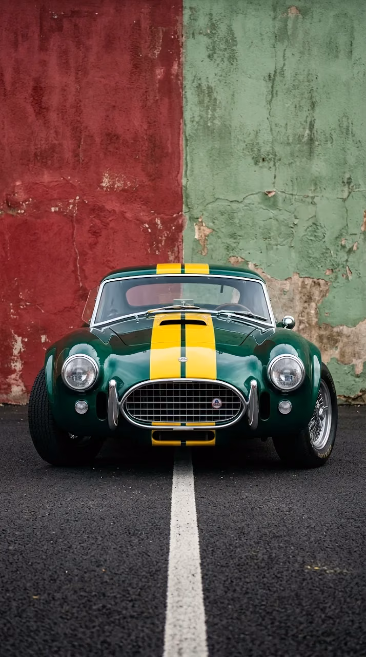 Download Classic Emerald Sports Car with Yellow Racing Stripes Wallpaper in Mobile HD Classic Emerald Sports Car with Yellow Racing Stripes - Free Mobile AMOLED Wallpaper Background