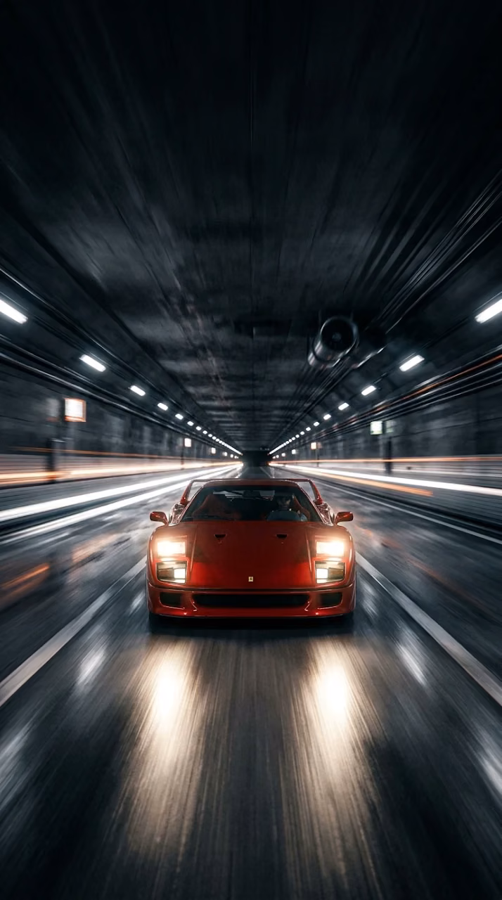 Classic Red Sports Car Speeding Through Dark Tunnel at Night - Free Mobile AMOLED Wallpaper Background