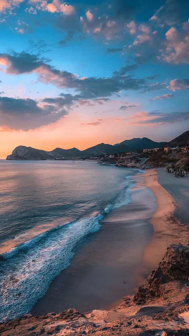 Download Coastal Sunset Beach View Over Turquoise Ocean Waves Wallpaper in Mobile HD Coastal Sunset Beach View Over Turquoise Ocean Waves - Free Mobile AMOLED Wallpaper Background
