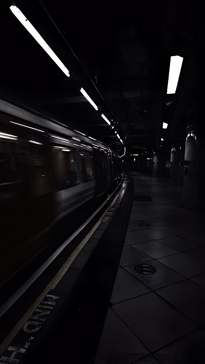 Download Dark Subway Platform with Moving Train and Overhead Lights Wallpaper in Mobile HD Dark Subway Platform with Moving Train and Overhead Lights - Free Mobile AMOLED Wallpaper Background