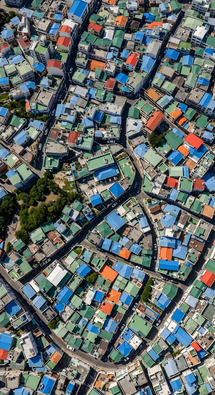 Dense Urban Landscape Aerial with Brightly Colored Rooftops - Free Mobile AMOLED Wallpaper Background