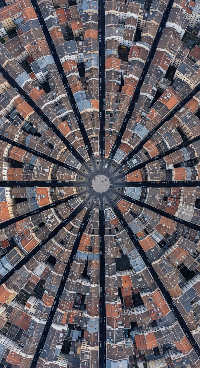 Download Directly Overhead Aerial View of Radial Street Intersection and City Buildings Wallpaper in Mobile HD Directly Overhead Aerial View of Radial Street Intersection and City Buildings - Free Mobile AMOLED Wallpaper Background