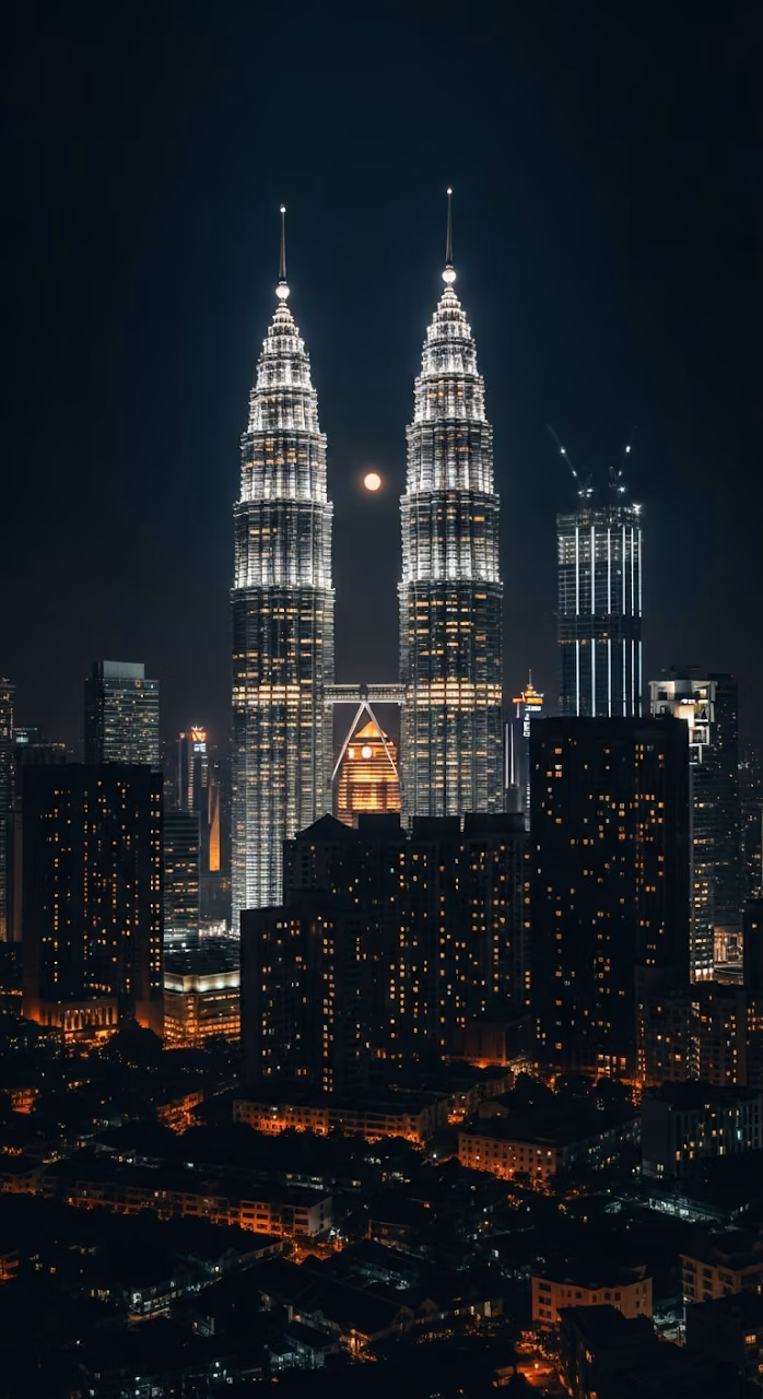 Download Dramatic Night View of Illuminated Petronas Twin Towers and Moon Over City Skyline Wallpaper in Mobile HD Dramatic Night View of Illuminated Petronas Twin Towers and Moon Over City Skyline - Free Mobile AMOLED Wallpaper Background