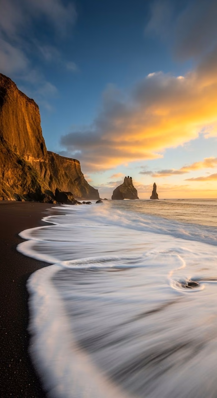 Download Dramatic Sunset Over Black Sand Beach with Foam and Orange Cliffs Wallpaper in Mobile HD Dramatic Sunset Over Black Sand Beach with Foam and Orange Cliffs - Free Mobile AMOLED Wallpaper Background