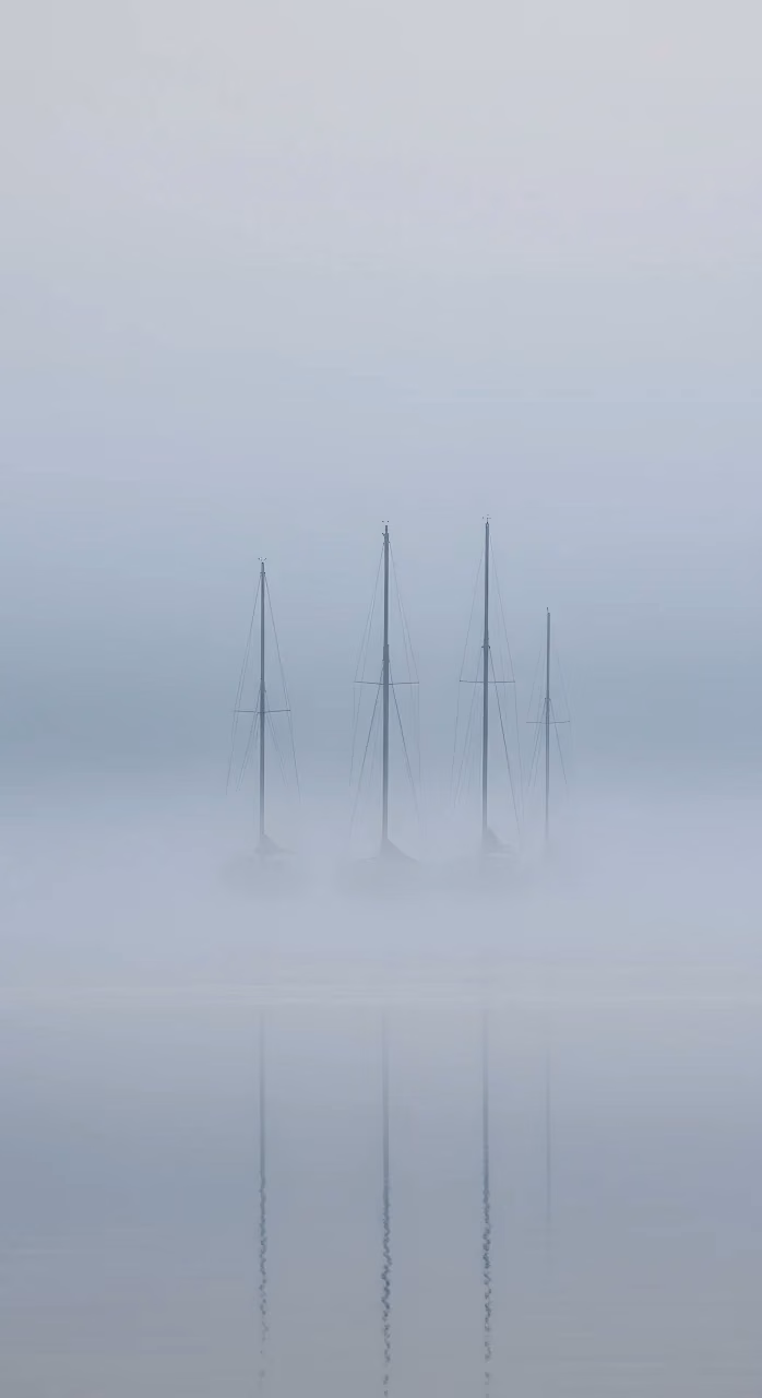Download Four Masts Reflected in Calm Water Through Blue Fog Wallpaper in Mobile HD Four Masts Reflected in Calm Water Through Blue Fog - Free Mobile AMOLED Wallpaper Background