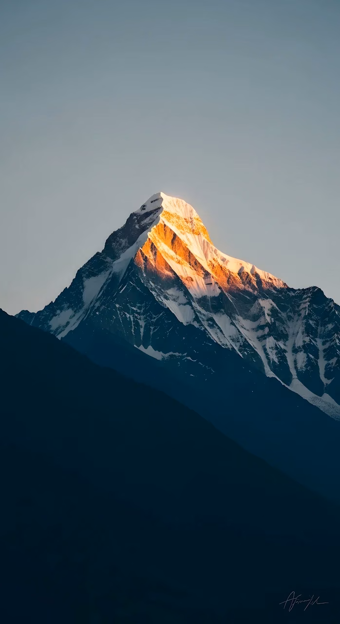 Golden Sunrise Light on Snow-Capped Himalayan Peak - Free Mobile AMOLED Wallpaper Background