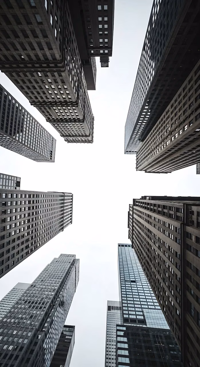 Download Low Angle View of Converging Dark Skyscraper Facades Wallpaper in Mobile HD Low Angle View of Converging Dark Skyscraper Facades - Free Mobile AMOLED Wallpaper Background