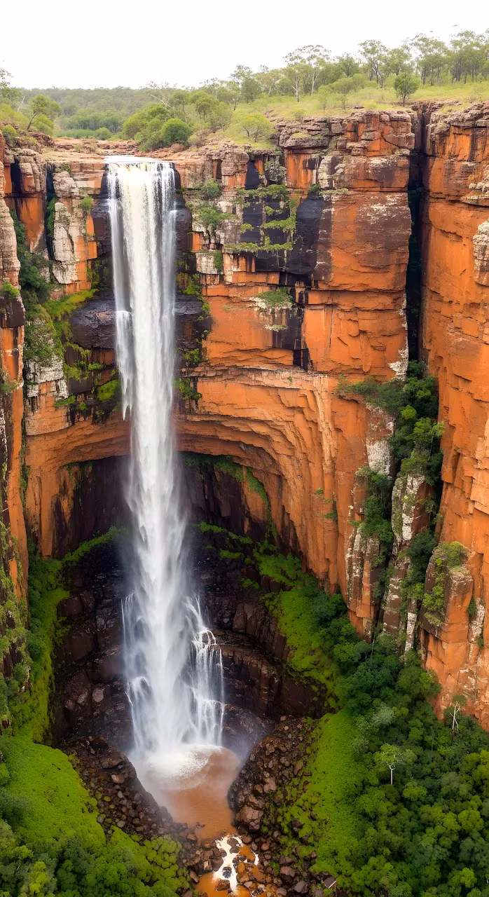 Download Majestic Waterfall Plunge into Red Sandstone Gorge Wallpaper in Mobile HD Majestic Waterfall Plunge into Red Sandstone Gorge - Free Mobile AMOLED Wallpaper Background
