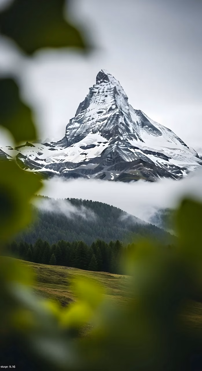 Matterhorn Peak Framed by Green Leaves and Fog - Free Mobile AMOLED Wallpaper Background
