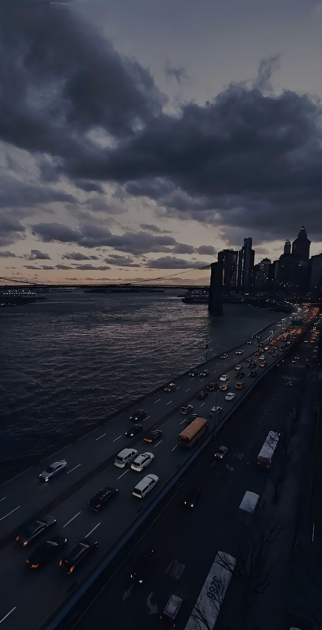 Moody Dusk Highway Traffic New York City Skyline View - Free Mobile AMOLED Wallpaper Background