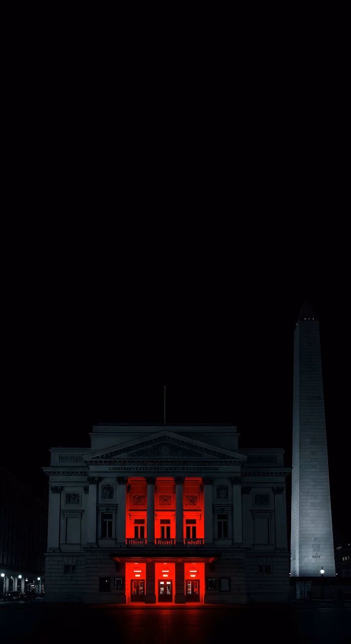 Neoclassical Building Illuminated by Dramatic Red Light at Night - Free Mobile AMOLED Wallpaper Background
