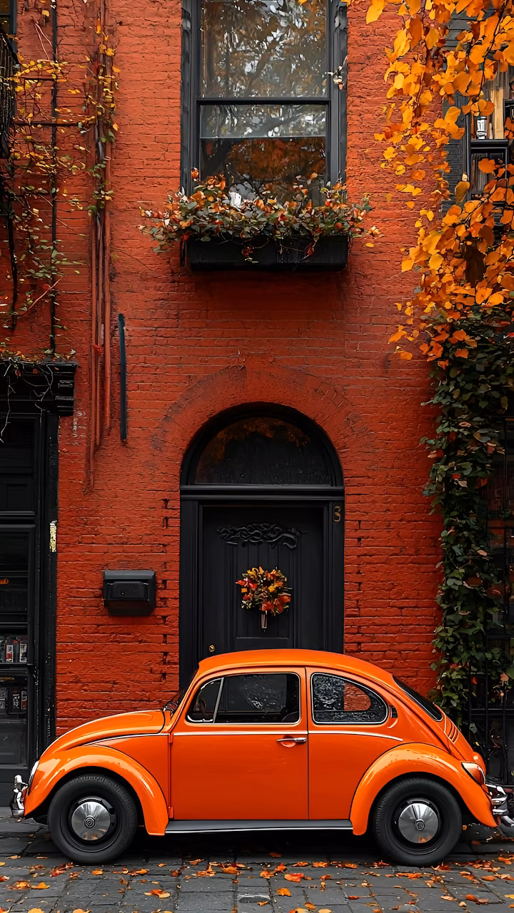 Orange Vintage Beetle Parked Before Red Brick House - Free Mobile AMOLED Wallpaper Background