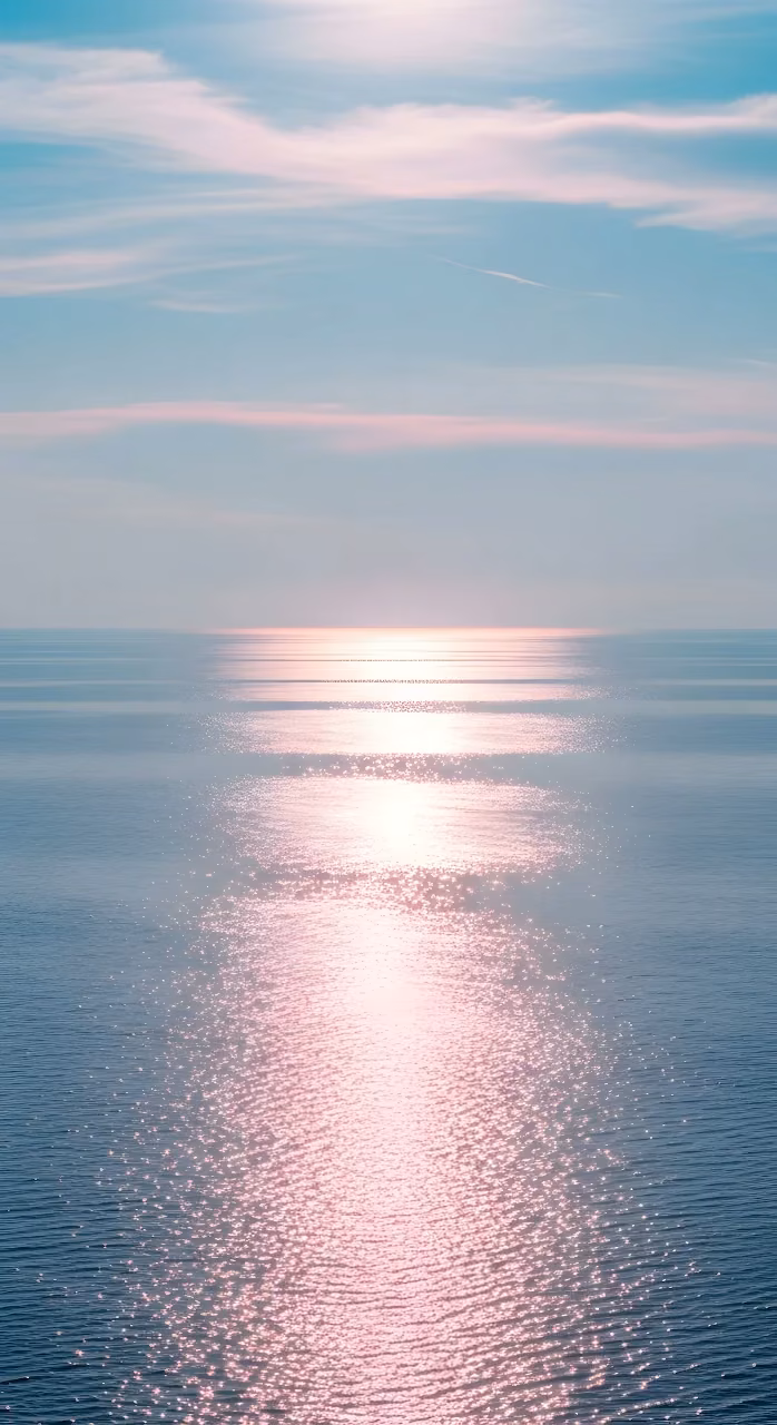 Pastel Pink Sun Glare on Calm Ocean Water at Sunset - Free Mobile AMOLED Wallpaper Background