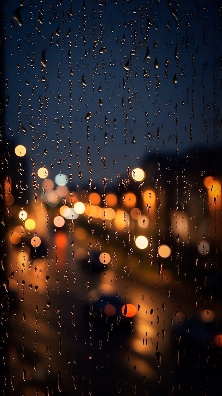 Download Raindrops on Window with Blurred City Lights Wallpaper in Mobile HD Raindrops on Window with Blurred City Lights - Free Mobile AMOLED Wallpaper Background