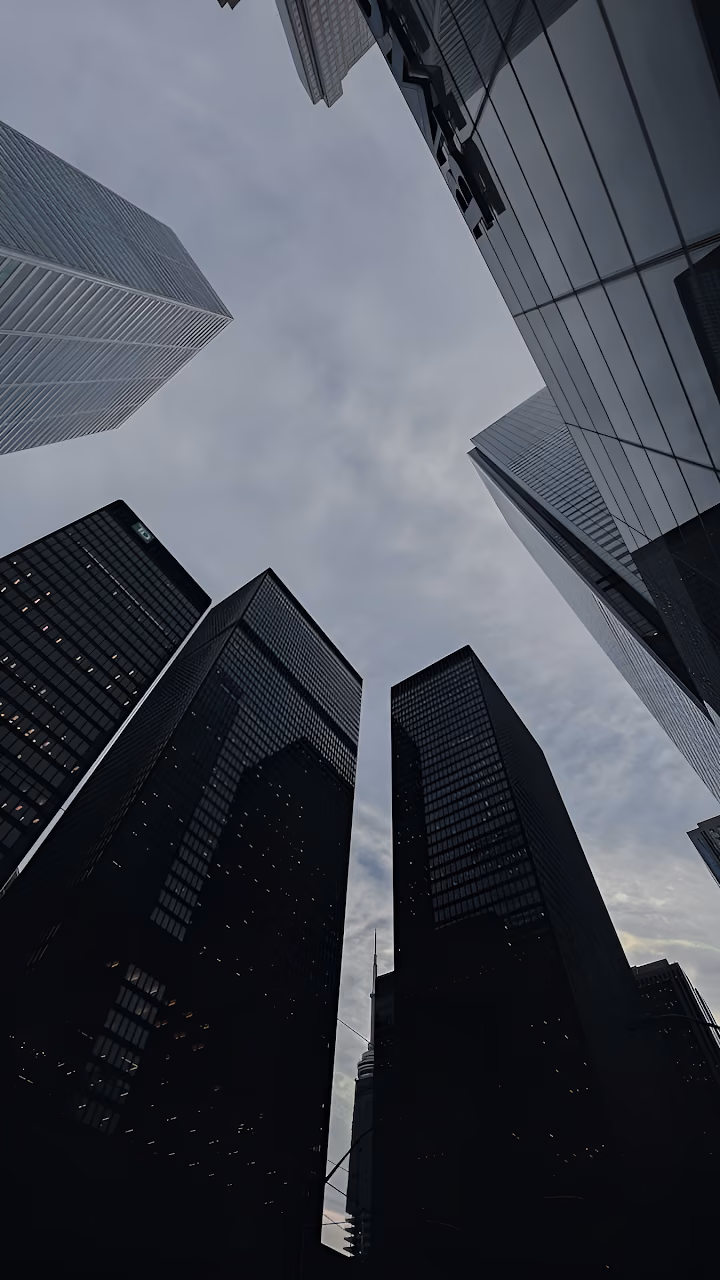 Download Skyscrapers Framing Cloudy Sky from Street View Wallpaper in Mobile HD Skyscrapers Framing Cloudy Sky from Street View - Free Mobile AMOLED Wallpaper Background