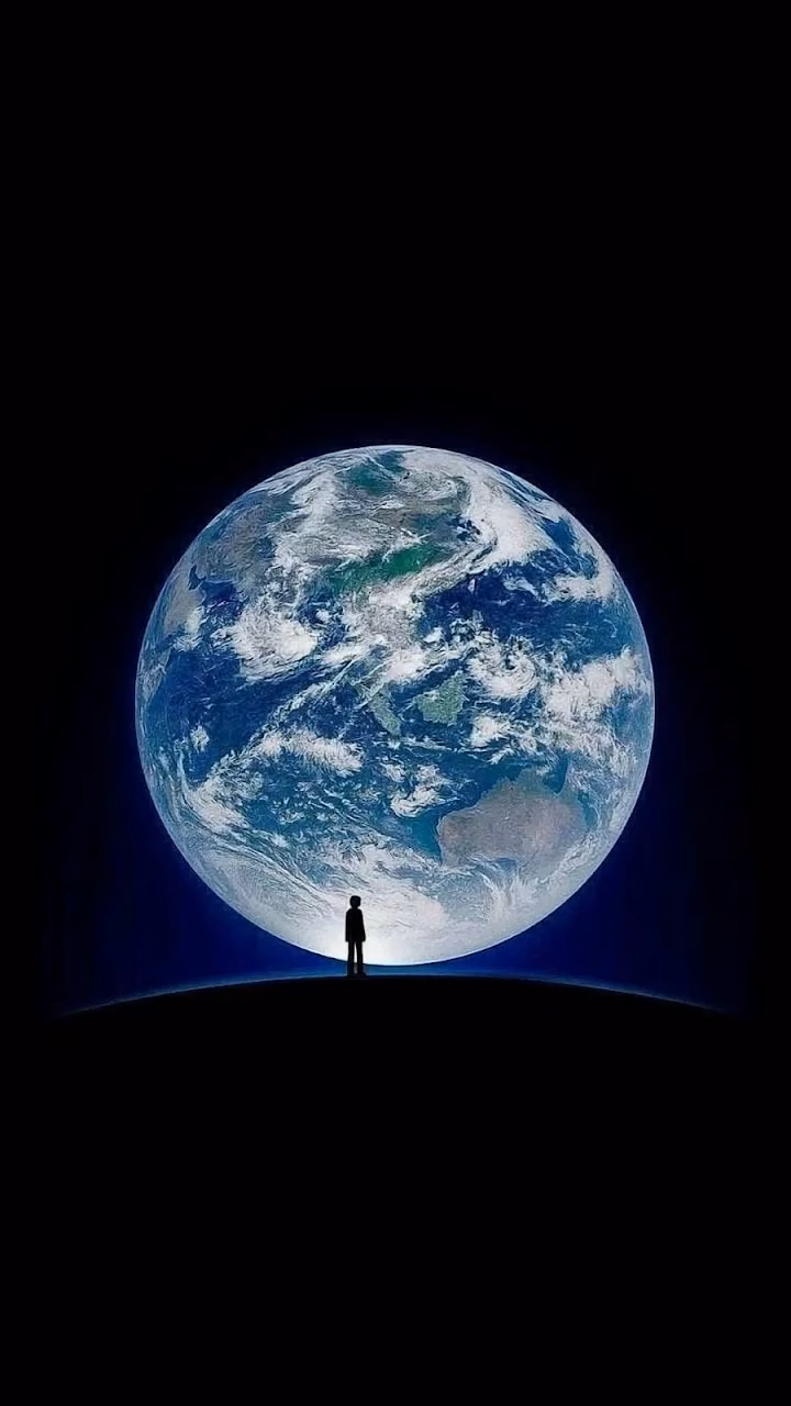 Download Solitary Figure Gazing at Giant Earth Sphere in Deep Space Wallpaper in 4K UHD Solitary Figure Gazing at Giant Earth Sphere in Deep Space - Free 4K Desktop Wallpaper Background