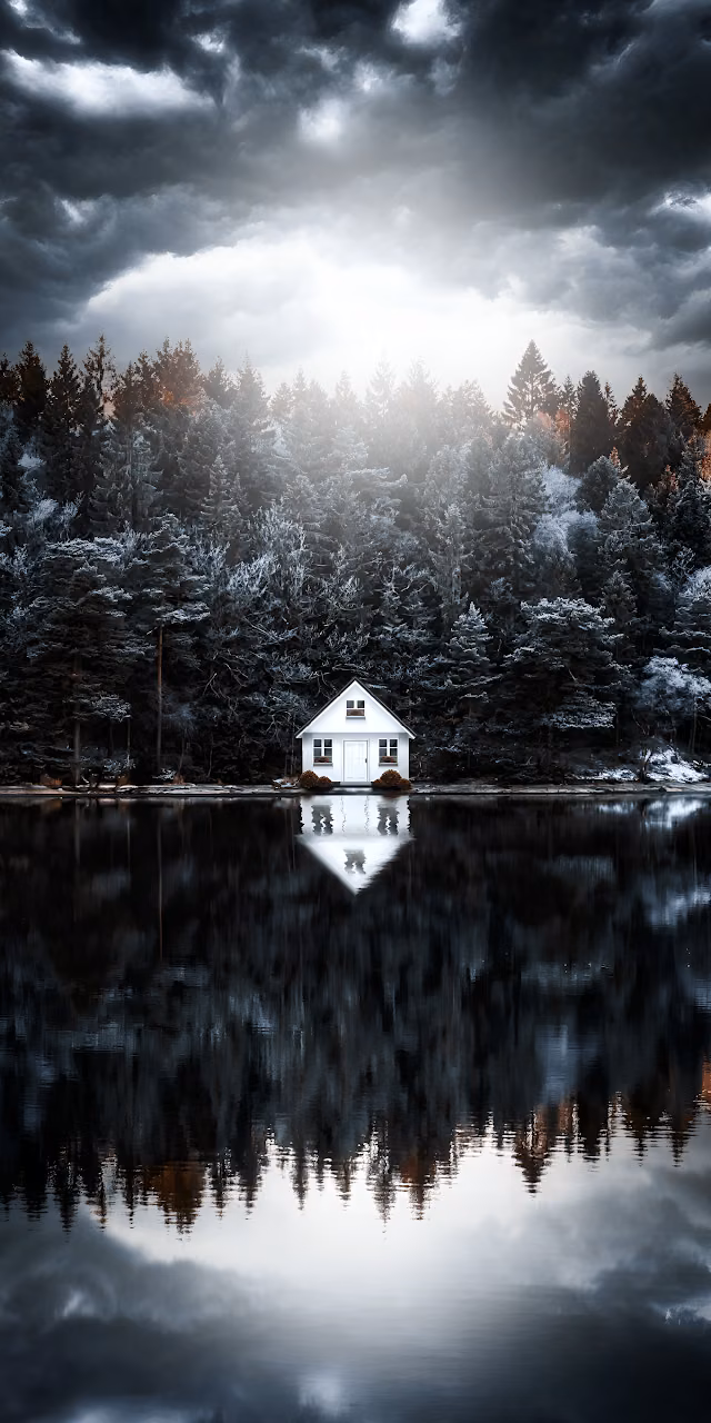 Solitary White Cabin Reflected in Dark Lake Under Stormy Sky - Free Mobile AMOLED Wallpaper Background