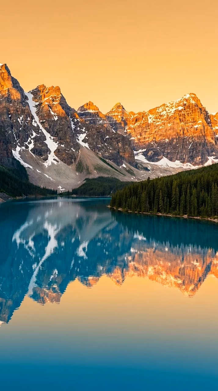 Download Stunning Lake Moraine with Turquoise Water and Golden Sunset Peaks Wallpaper in Mobile HD Stunning Lake Moraine with Turquoise Water and Golden Sunset Peaks - Free Mobile AMOLED Wallpaper Background