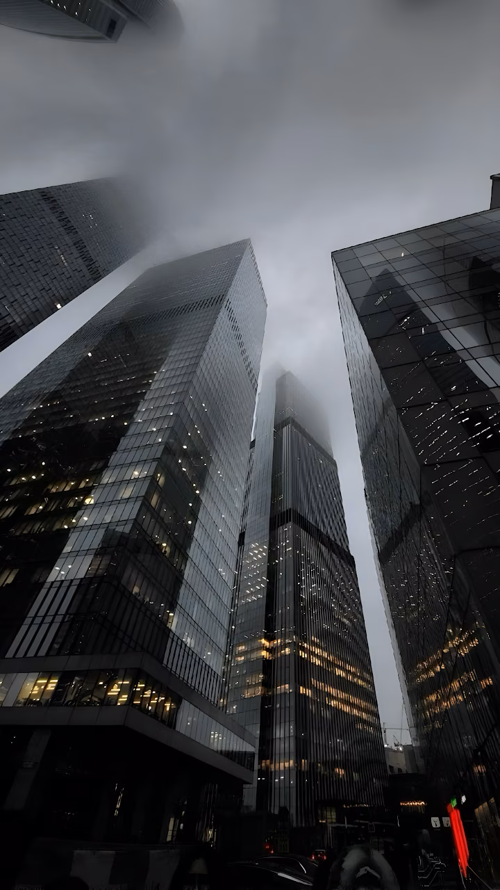 Download Towering Skyscrapers Vanishing Into Foggy Sky Wallpaper in Mobile HD Towering Skyscrapers Vanishing Into Foggy Sky - Free Mobile AMOLED Wallpaper Background