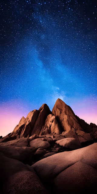 Desert Mountains Under Vibrant Starry Night Sky - Free 4K & 8K Mobile Wallpaper