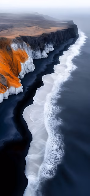 Dramatic Aerial View of Black Sand Beach and Orange Cliffs - Free 4K & 8K Mobile Wallpaper