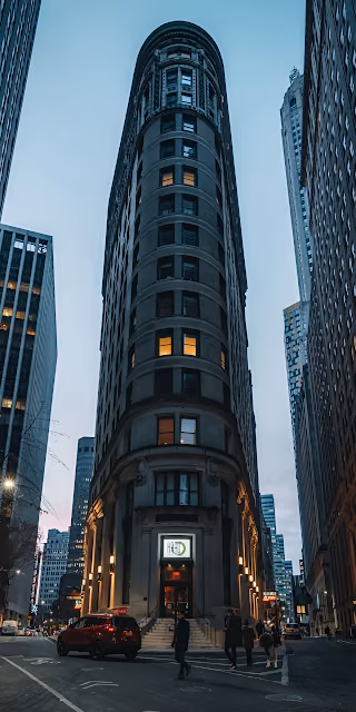 Flatiron Building at Dusk with Warm Window Lights - Free 4K & 8K Mobile Wallpaper