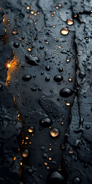Glistening Water Droplets on Dark Textured Surface - Free 4K & 8K Mobile Wallpaper