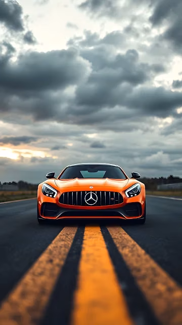 Orange Luxury Sports Car on Racing Track - Free 4K & 8K Mobile Wallpaper