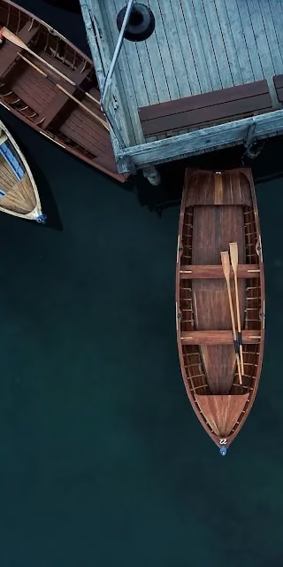 Overhead View of Vintage Wooden Rowboats Docked on Water - Free 4K & 8K Mobile Wallpaper