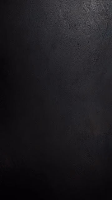 Textured Black Surface with Subtle Grain - Free 4K & 8K Mobile Wallpaper