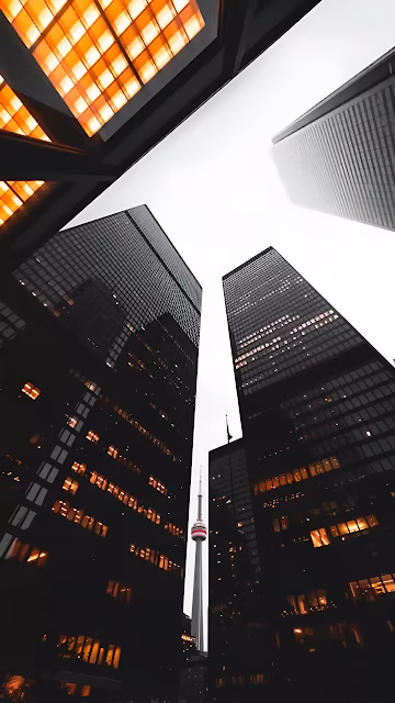 Toronto Skyscrapers Framing CN Tower at Dusk - Free 4K & 8K Mobile Wallpaper