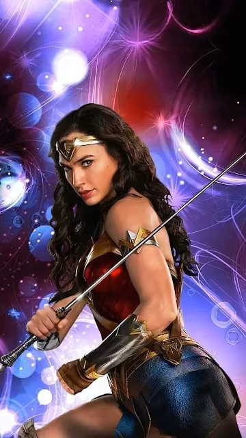 Wonder Woman poses with a sword surrounded by vibrant purple and magenta light effects. Wonder Woman holding a sword in armored costume against a backdrop of purple and magenta glowing lights.